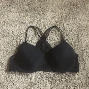 Black lacy bra with front clasp.